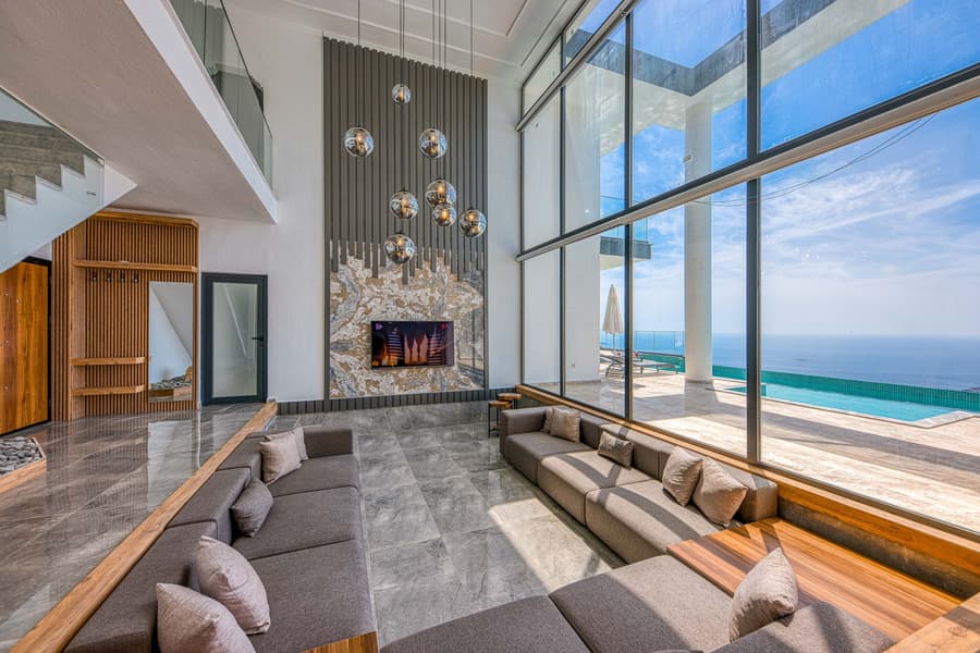 The Esplanade, Brighton: the living room glass, open to the pool and the bay.