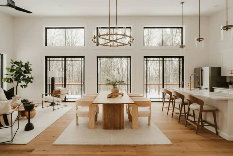 Level 4: a double-height dining room with an oak table.