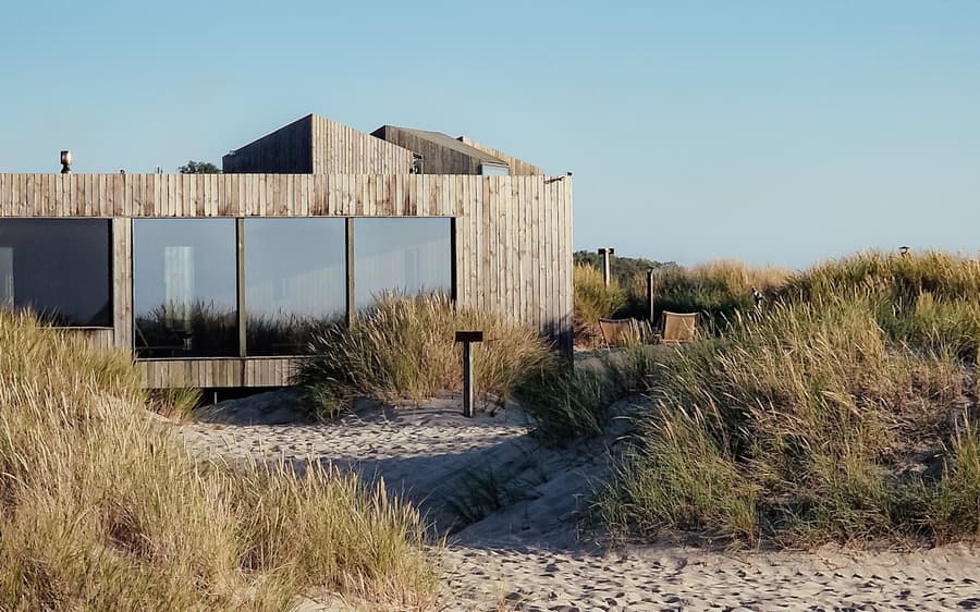 Point King, Portsea: a timber house in the dune grass.