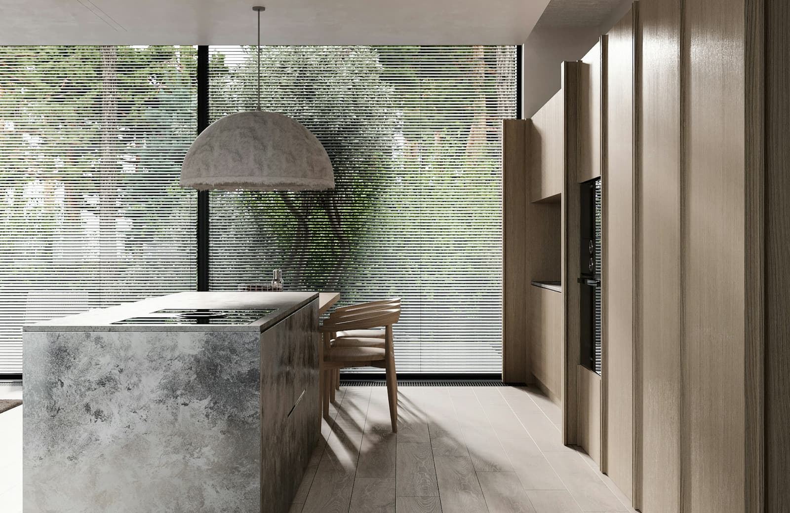 A kitchen in grey stone and pale timber, with light off the water on the ceiling.