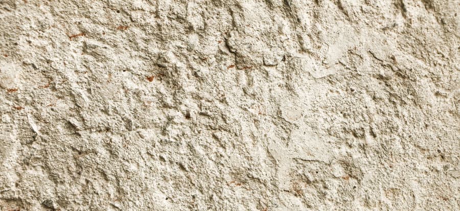 Split limestone wall, close up.